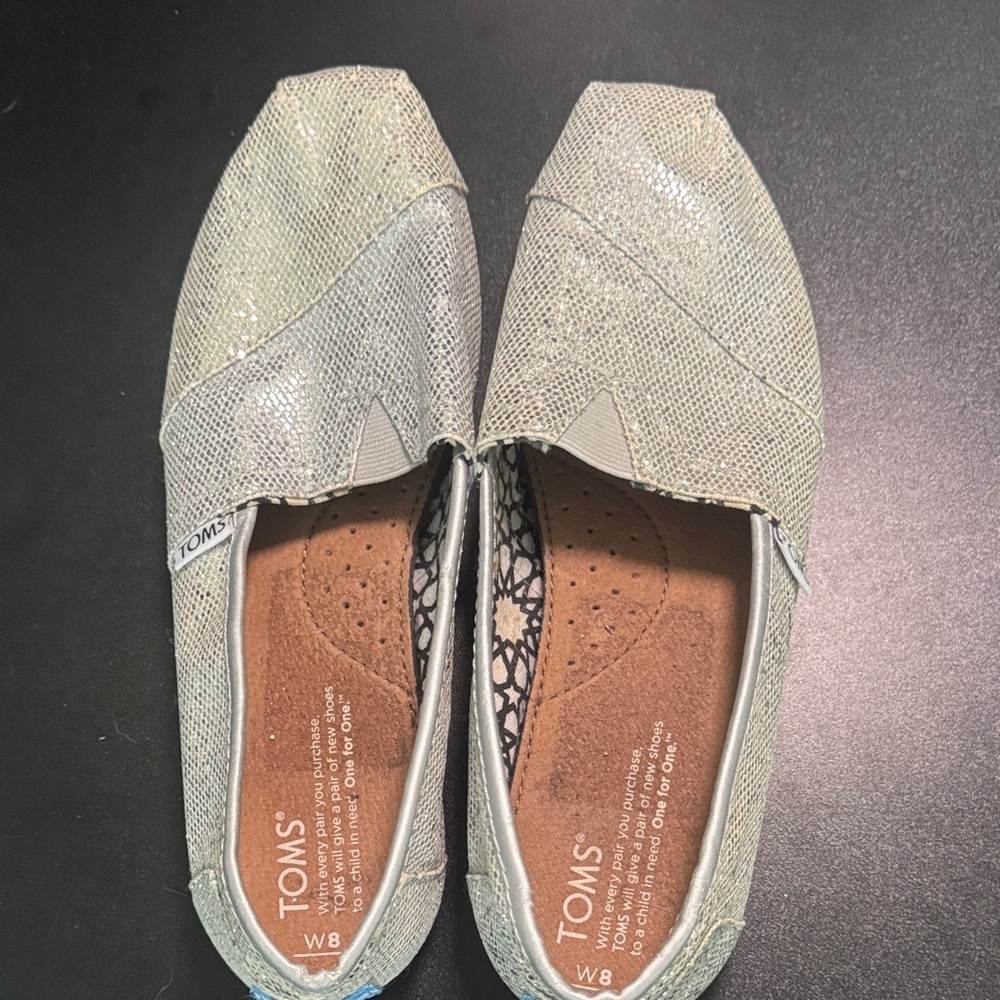 TOMS Shimmering Silver Slip-Ons - Picture 3 of 4